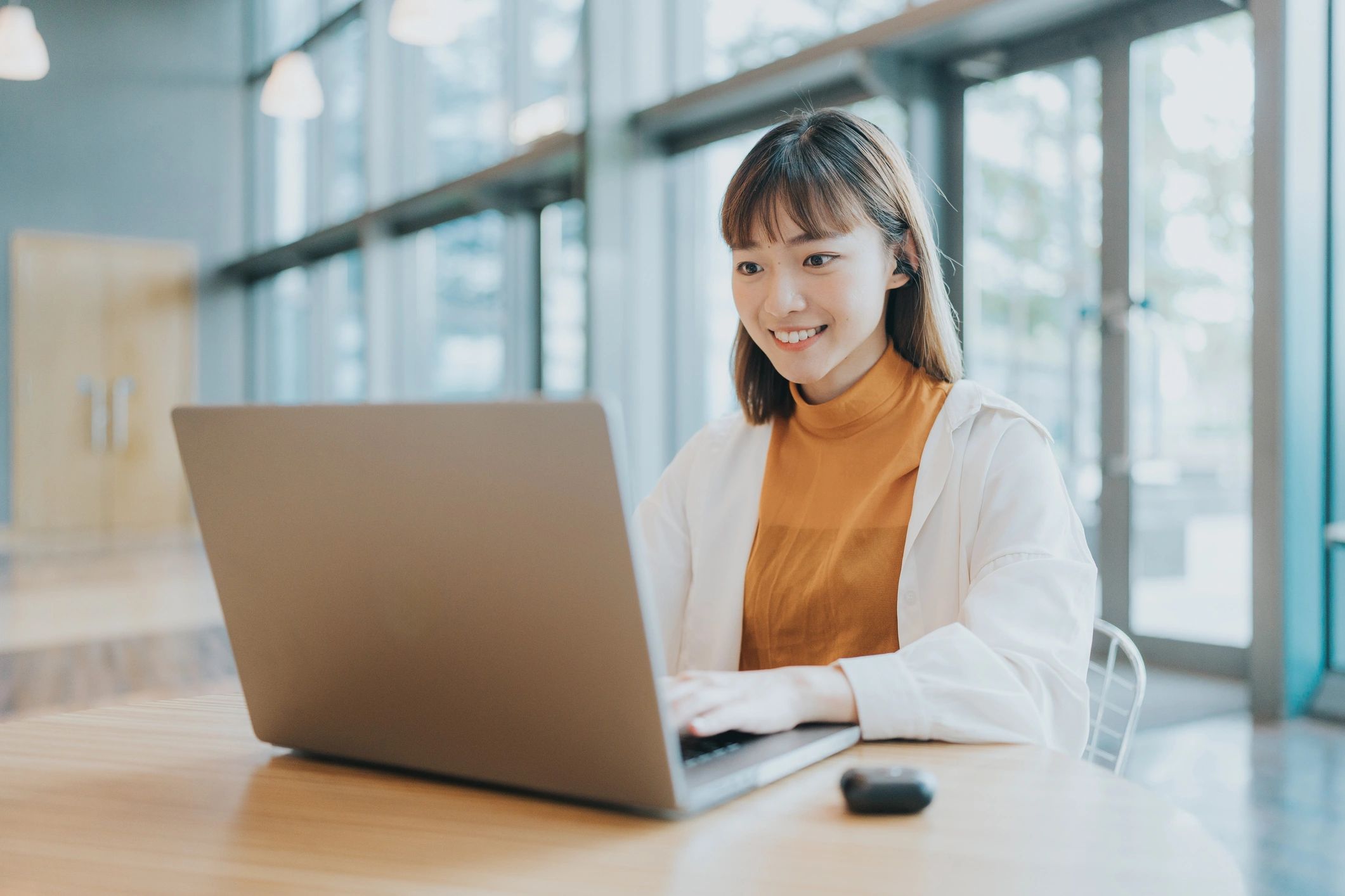 Travel planner working on a laptop